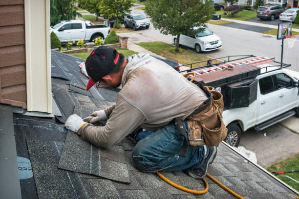 Professional Roofing technician working in Forbes Road, PA